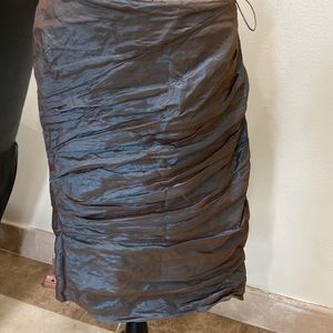 Bought from Neiman Marcus wrinkled skirt with shins in it
